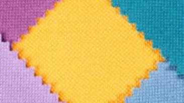 Composition of colored pieces of serrated cotton fabric.